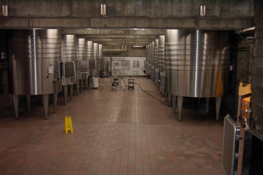 Make sure cellar equipment is properly cleaned and in good working order before harvest. [Opus One cellar, 2004.]