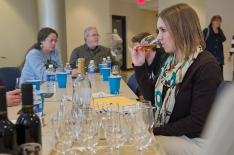 Penn State Extension Enologist, Denise M. Gardner, tastes wines with Wine Quality Improvement (WQI) Short Course attendees to diagnose wine defects/flaws within commercial wines.
